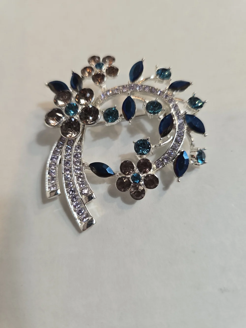 Anne Klein Silver-Tone Floral Brooch with Navy and Teal Crystals